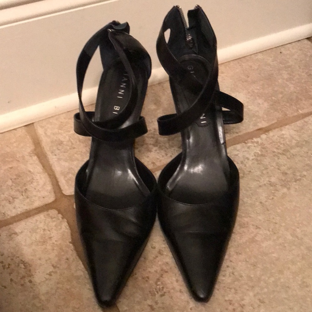 Cross strap pumps with silver back zipper.